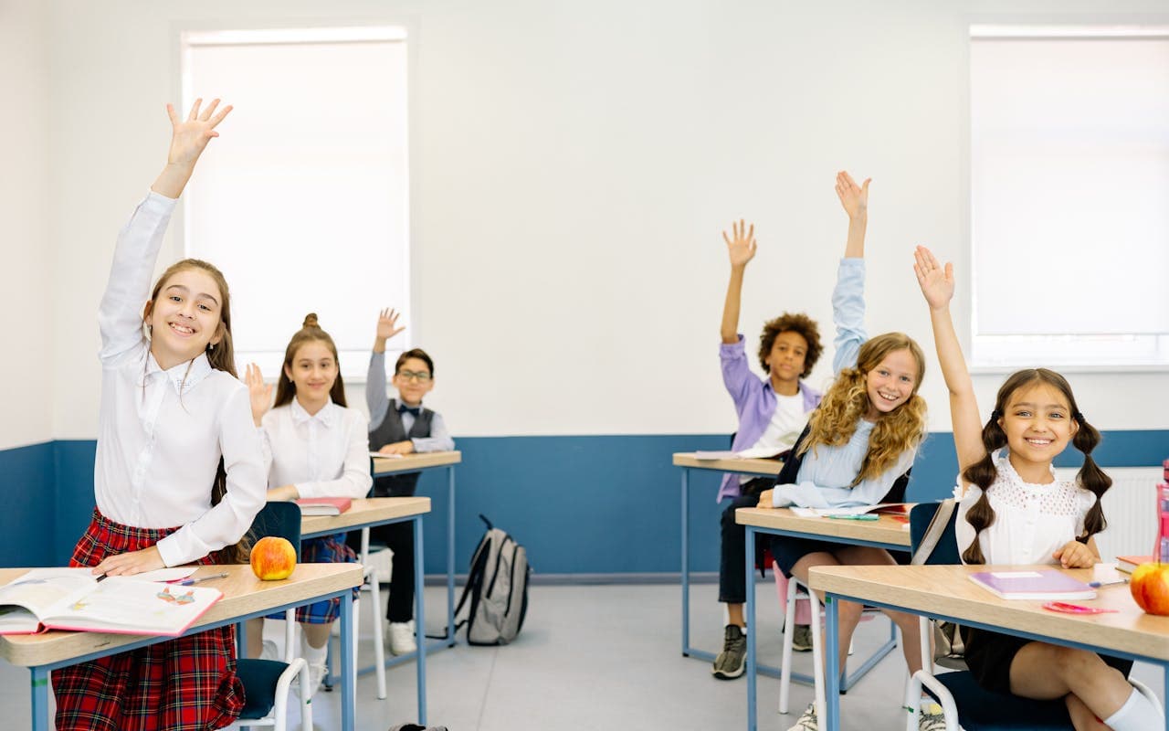 Children in a bright international-school classroom